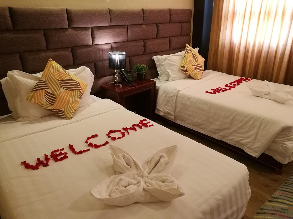 Great Wall Hotel Dar es Salaam Habitación foto
